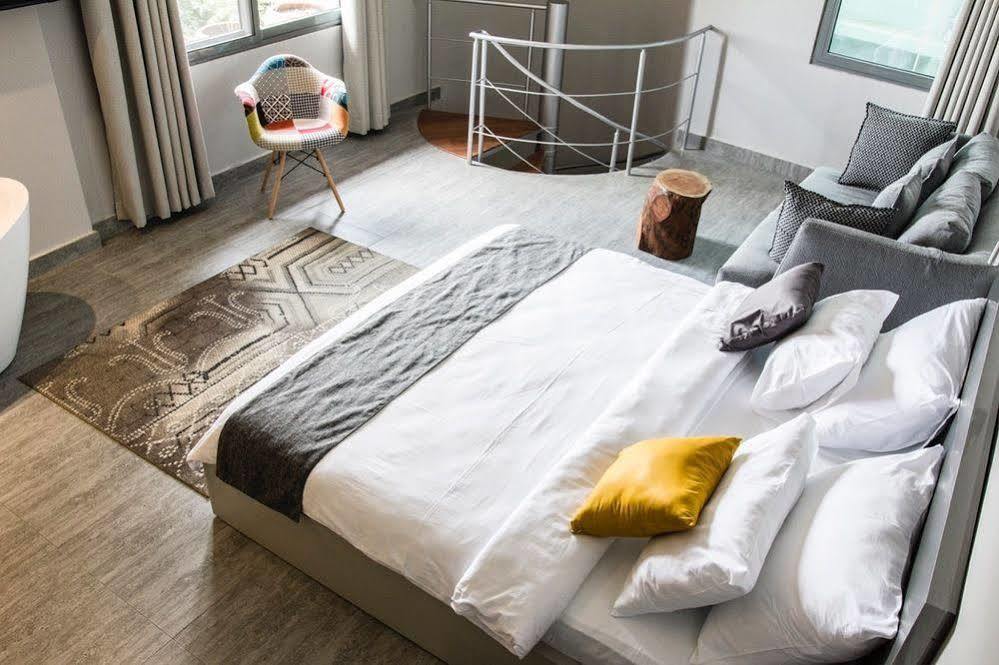 Urbano Hotel By Roots Wiaboman Esterno foto